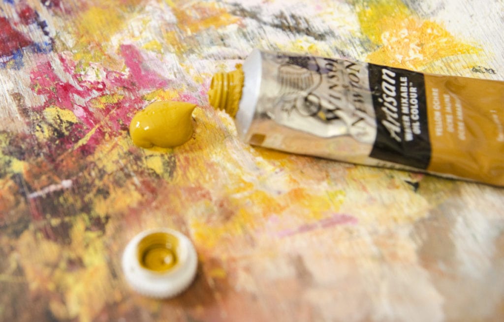 yellow ochre oil paint on the palette
